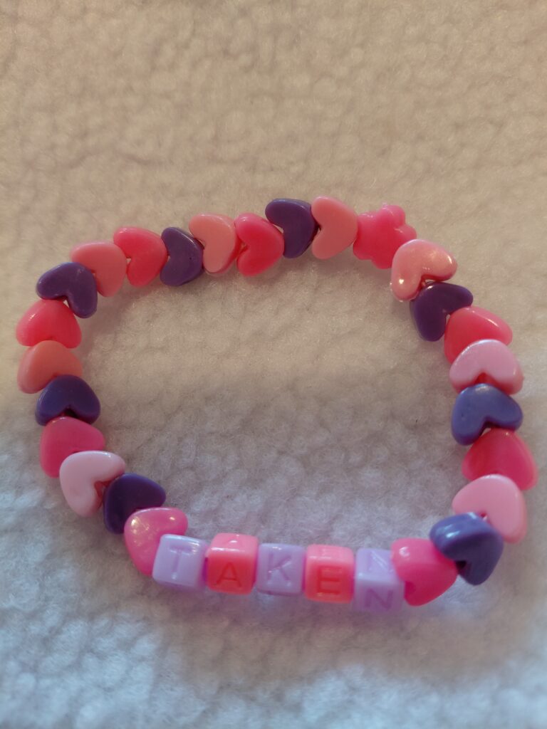 Taken Love Charm Bracelet